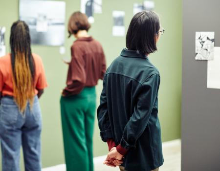 young people looking at art